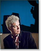 David Byrne listens to Ken Goldberg during GBU slides